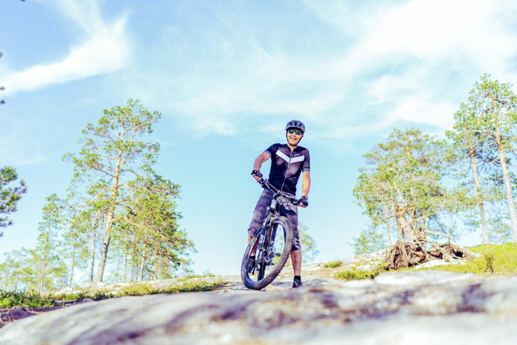 A man enjoying mountain biking.